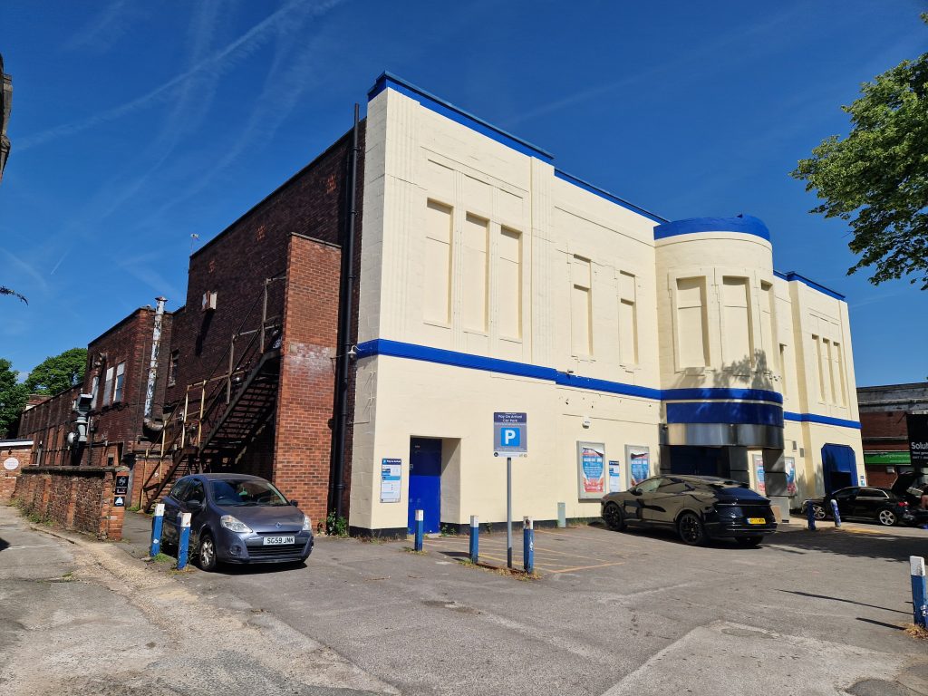Asbestos survey being carried out in Essex property Asbestos sample testing for survey report Professional asbestos surveyor inspecting building